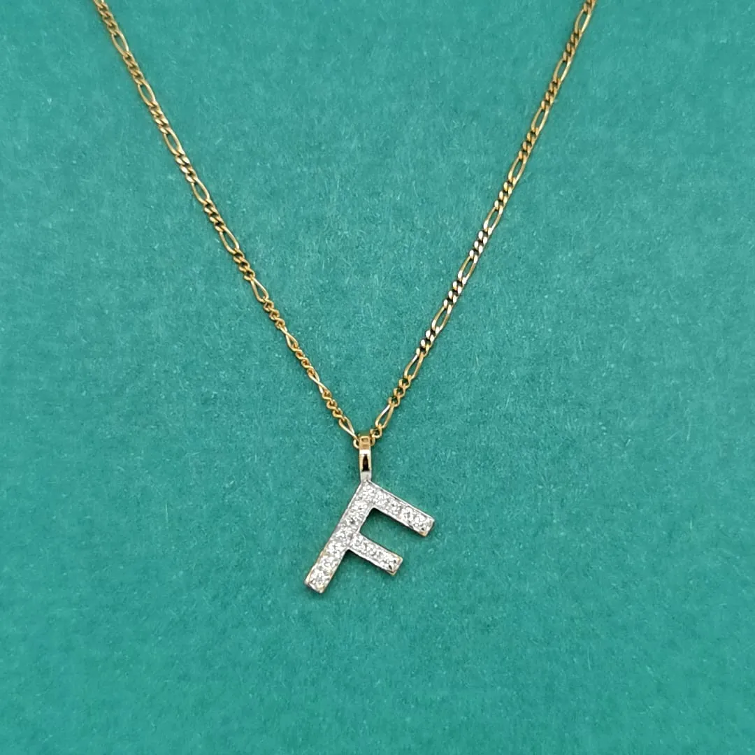 Alphabet F Diamond Pendant In 18k Yellow Gold.