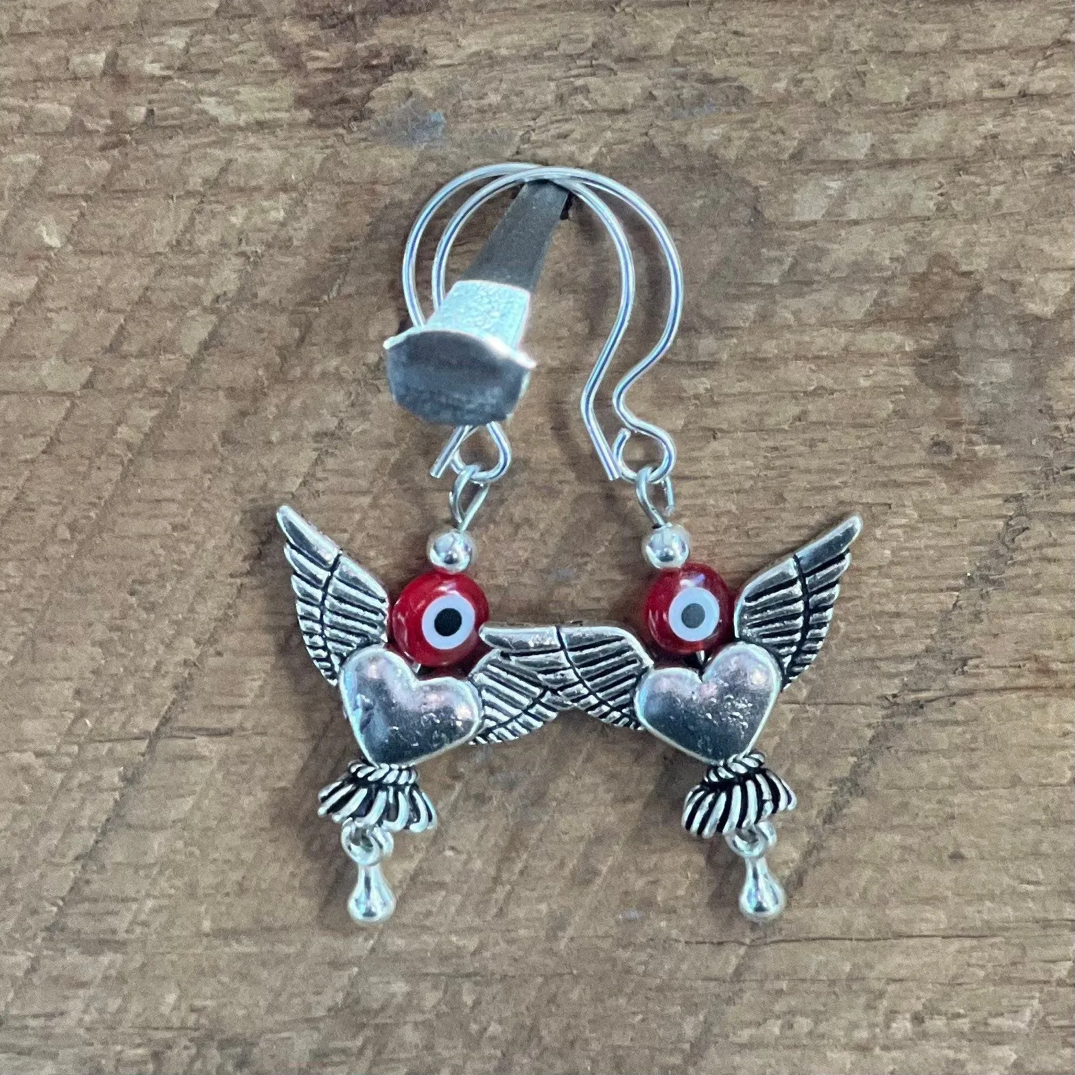 SariBlue® Red Evil Eye and Silver Winged Heart Earrings